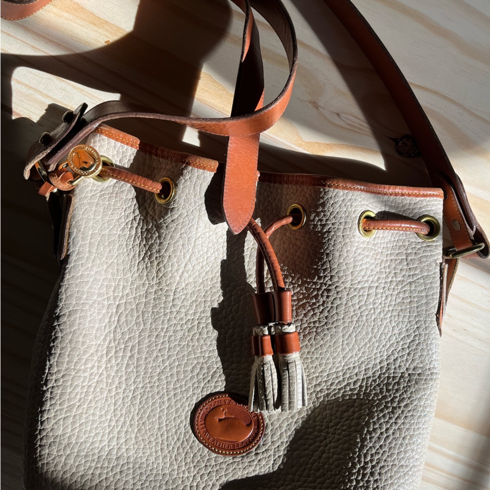 Irregular vintage Dooney and Burke purse